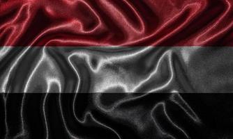 papel de parede por bandeira do Iêmen e bandeira por tecido. foto