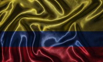 papel de parede pela bandeira da Colômbia e bandeira por tecido. foto