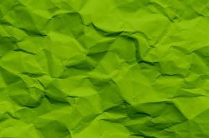 fundo verde e papel de parede por textura de papel amassado. foto