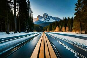 uma grandes estrada com neve coberto montanhas dentro a fundo. gerado por IA foto