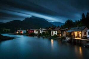 uma lago e casas dentro a montanhas às noite. gerado por IA foto