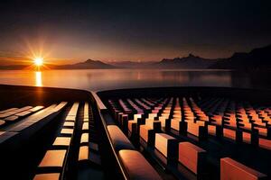 a Sol conjuntos sobre uma lago com linhas do cadeiras. gerado por IA foto