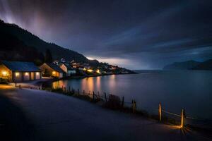 uma Vila em a costa do uma lago às noite. gerado por IA foto