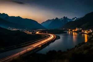 uma grandes exposição fotografia do uma rio e montanhas às noite. gerado por IA foto