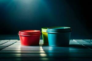 três colorida plástico containers sentar em uma mesa. gerado por IA foto