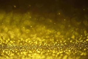 fundo de luzes brilhantes de glitter dourados