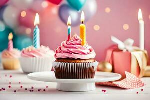 aniversário bolos de copo com velas em uma mesa. gerado por IA foto