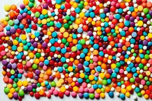 uma pilha do colorida doces em uma branco superfície. gerado por IA foto