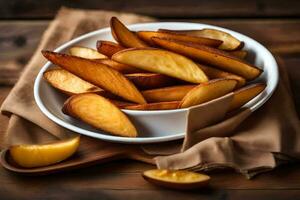 frito batata cunhas dentro uma branco tigela em uma de madeira mesa. gerado por IA foto