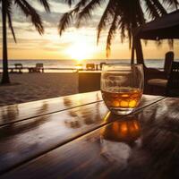 vidro do aperol spritz coquetel em de madeira mesa com pôr do sol borrão de praia fundo ai generativo foto