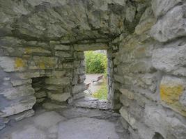 parede de tijolo de pedra centro histórico cidade velha de tallinn, estônia foto