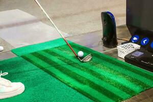 golfe dirigindo alcance endereço postura foto