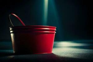 uma vermelho balde em uma Sombrio chão com uma Holofote. gerado por IA foto
