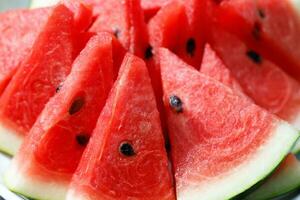 vermelho Melancia fruta textura fundo cenário rico dentro saudável nutrientes foto