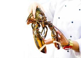 lagosta fresca no mercado de frutos do mar foto