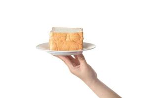chef segurando torradas de pão de trigo fatiado em fundo branco foto