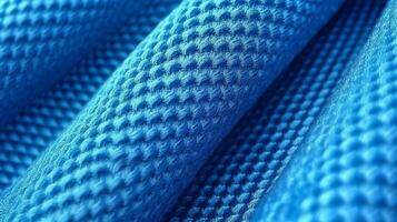 azul futebol tecido textura com ar malha. roupa de esporte fundo foto