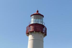 isto é capa pode ponto farol dentro Novo jérsei. Eu amor a branco Veja do Está torre e a vermelho topo para isto este carrinhos Fora a partir de tão muitos. isto baliza do esperança ajuda pessoas às mar para navegar. foto