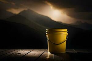uma amarelo balde senta em uma de madeira mesa dentro frente do uma montanha. gerado por IA foto