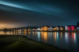 uma linha do casas em a costa do uma lago às noite. gerado por IA foto