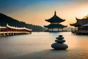 uma pedra pilha senta em a costa do uma lago às pôr do sol. gerado por IA foto