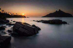 a Sol conjuntos sobre a oceano e pedras. gerado por IA foto