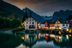 uma Cidade dentro a montanhas às noite com uma lago e montanhas dentro a fundo. gerado por IA foto