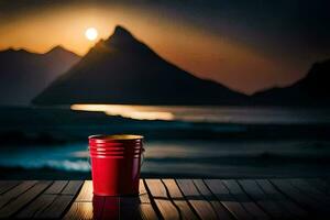 uma vermelho copo sentado em uma de madeira mesa dentro frente do uma montanha. gerado por IA foto