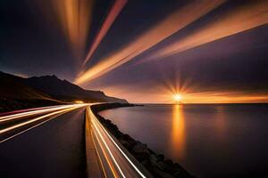 uma grandes exposição fotografia do uma estrada e a Sol configuração sobre a oceano. gerado por IA foto