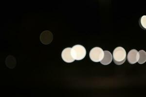noite luzes borrado rodadas fundo foto
