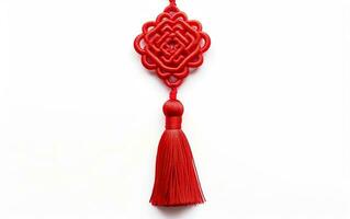 chinês simétrico ornamento, uma vermelho nó com escova franja isolado em branco fundo. símbolo do Boa sorte. ai generativo foto