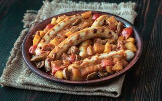 tailandês vermelho Curry com salsichas foto