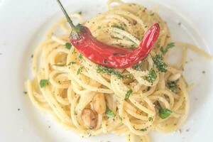 espaguete aglio olio e peperoncino foto