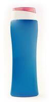azul plástico garrafa com xampu gel em branco fundo foto