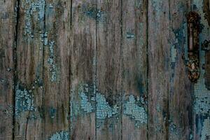 de madeira fundo do a velho de madeira pranchas com sobras do azul pintar. natural textura do pintado madeira. foto