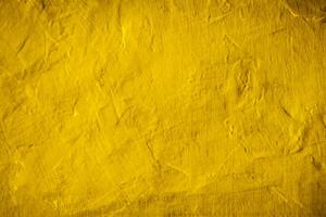 fundo de textura de parede de concreto amarelo foto