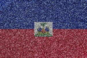 Haiti bandeira retratado em muitos pequeno brilhante lantejoulas. colorida festival fundo para festa foto