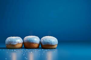 ai gerado hanukkah rosquinhas com em pó açúcar em uma azul fundo. foto