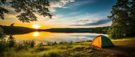 ai gerado acampamento barraca em a costa do uma lago às pôr do sol. foto