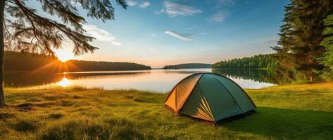 ai gerado acampamento barraca em a costa do uma lago às pôr do sol. foto