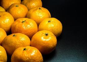 textura de superfície brilhante de frutas frescas de laranja foto
