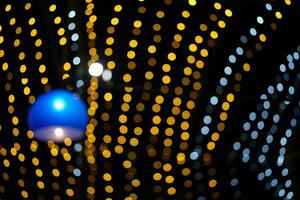 Natal conceito 2024 bokeh fundo do luzes a partir de Natal árvore decorações dentro celebração foto