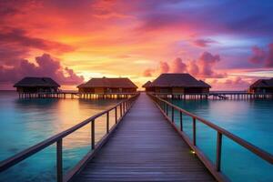 ai gerado de madeira cais às pôr do sol dentro tropical Maldivas ilha com água bangalôs, a surpreendente pôr do sol paisagem, pitoresco verão pôr do sol dentro a Maldivas, luxo recorrer vilas marinha foto