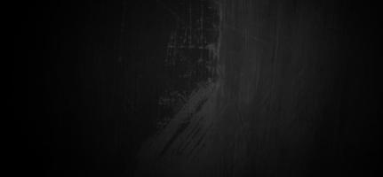 fundo de cimento grunge escuro com arranhões, textura de parede escura de terror foto