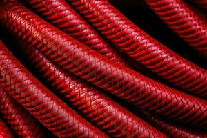 ai gerado vermelho texturizado Forte cabo detalhe padronizar industrial fio aço fechar ferro abstrato foto