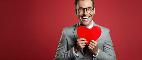 ai gerado retrato do uma feliz homem com uma vermelho coração em dia dos namorados dia conceito. foto