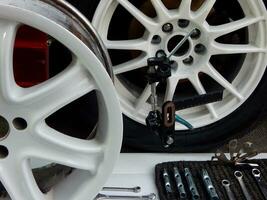 ajustando Ferramentas para medindo carro disco roda foto