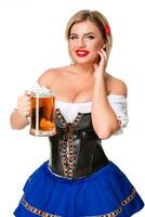 lindo jovem loiro menina do oktoberfest Cerveja stein foto