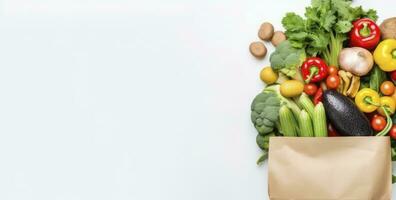 ai gerado saudável Comida dentro papel saco legumes e frutas em branco fundo. ai gerado foto