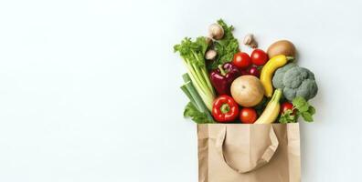 ai gerado saudável Comida dentro papel saco legumes e frutas em branco fundo. ai gerado foto